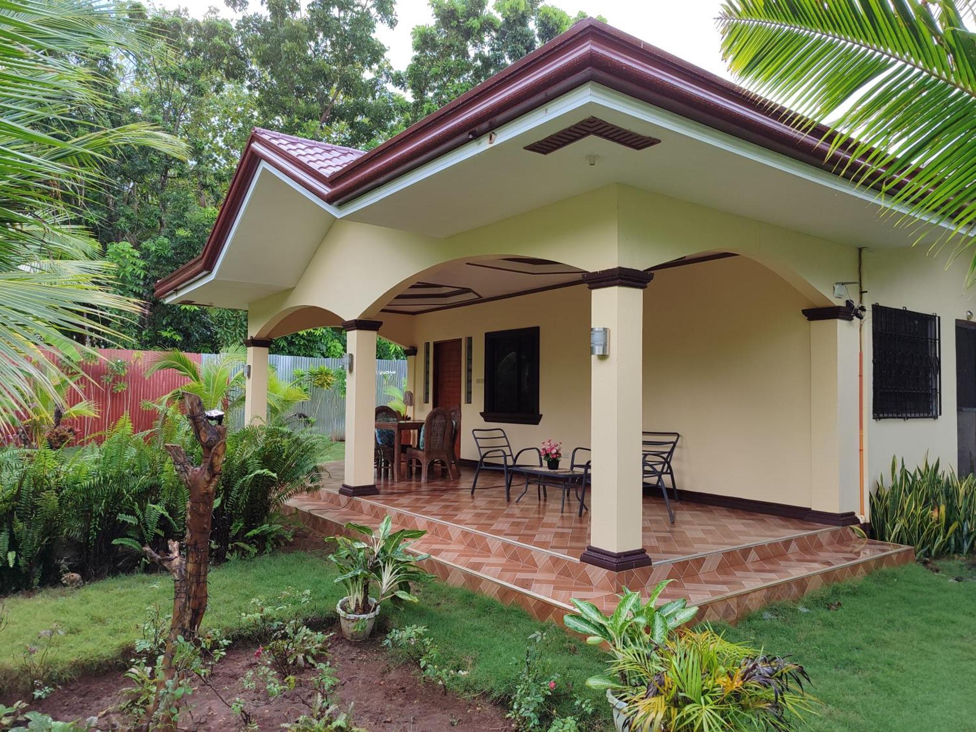 E&N Paradise Island Resort Siquijor Chambre photo
