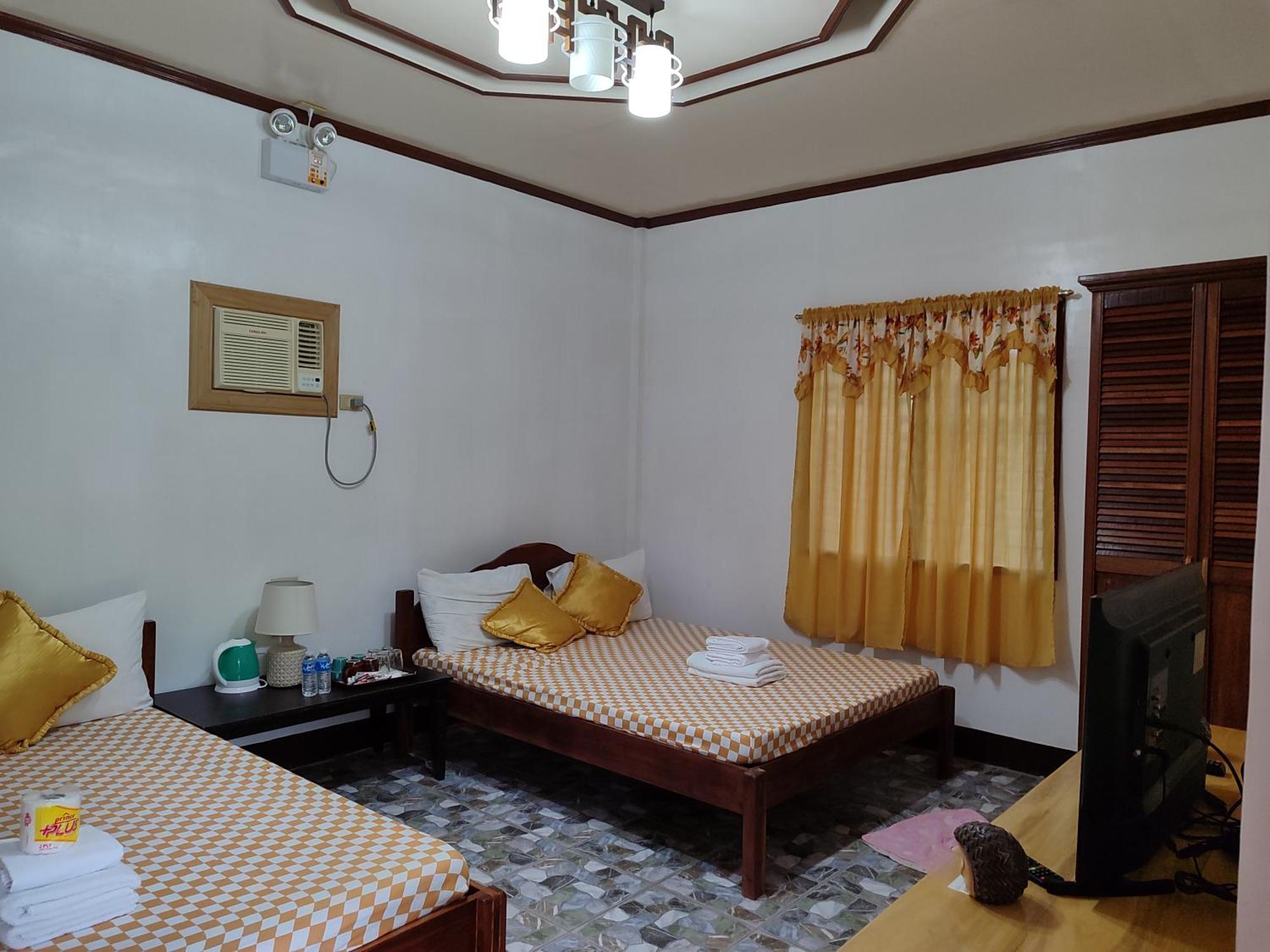 E&N Paradise Island Resort Siquijor Chambre photo